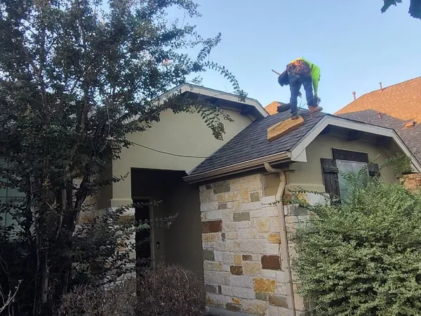 Re-roof on a stone ranch home