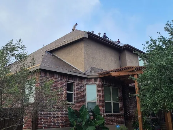 Two-story brick home re-roof