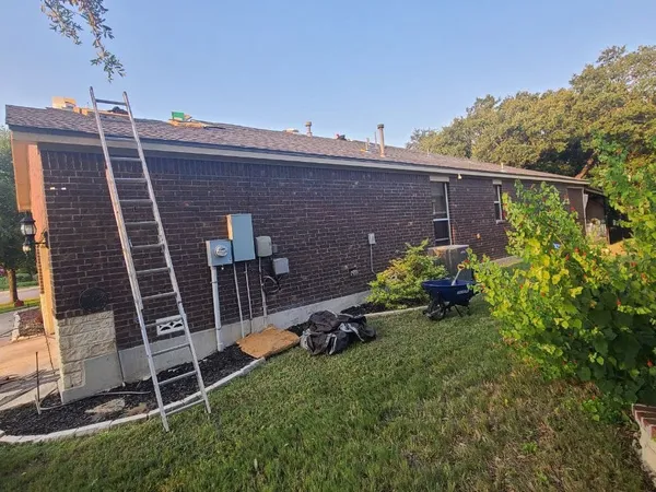Brick home re-roof with ladder access