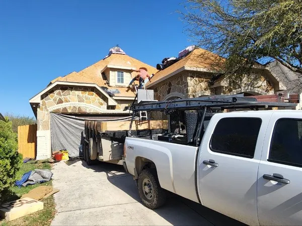 Materials and crew truck on site